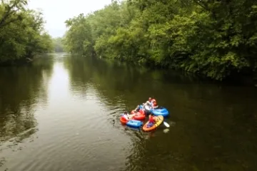 a small boat in a body of water