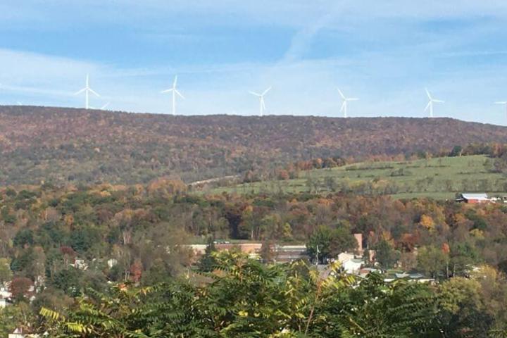 a view of a city with a mountain in the background
